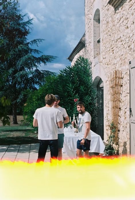Guests talking outdoors before the wedding