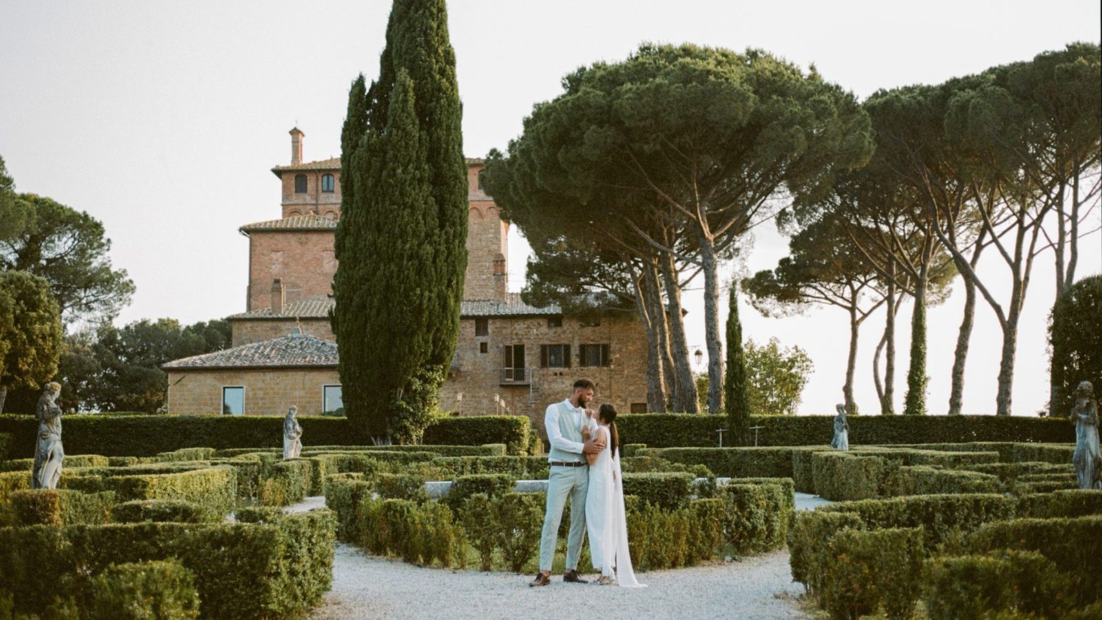 Couple embracing in a garden maze